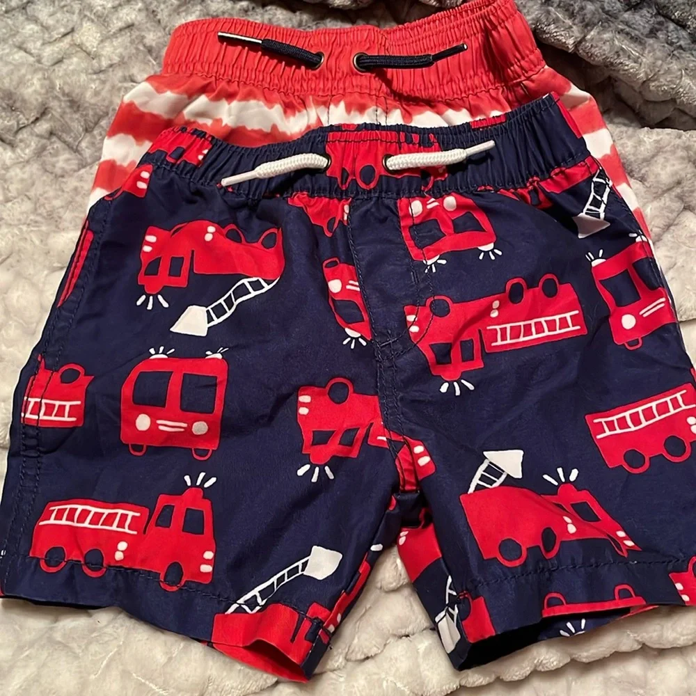 Carter’s~2 Boys Swim Shorts in Red, White and Blue. Elastic Waistband Size:12M